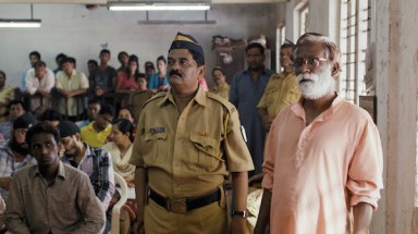 Vira Sathidar (right) as Narayan Kamble in COURT. A film by Chaitanya Tamhane. A Zeitgeist Films release.