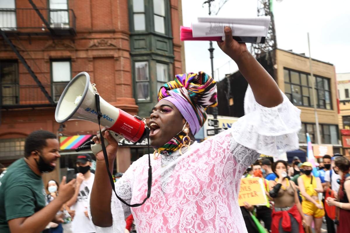 Trans lib march Qween Jean by Donna Aceto