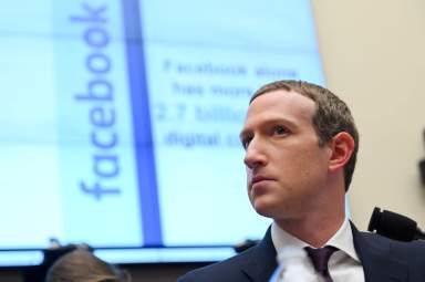 FILE PHOTO: Facebook Chairman and CEO Zuckerberg testifies at a House Financial Services Committee hearing in Washington