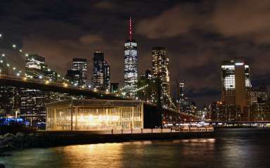 The spire of One World Trade Center lit red for World AIDS Day.