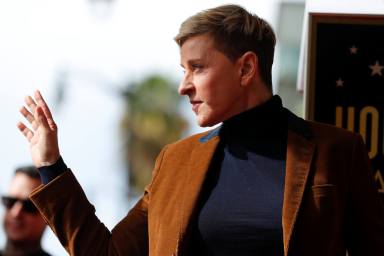 Comedian and talkshow host Ellen DeGeneres waves to fans as she attends a ceremony for singer Pink at the Hollywood Walk of Fame in Los Angeles