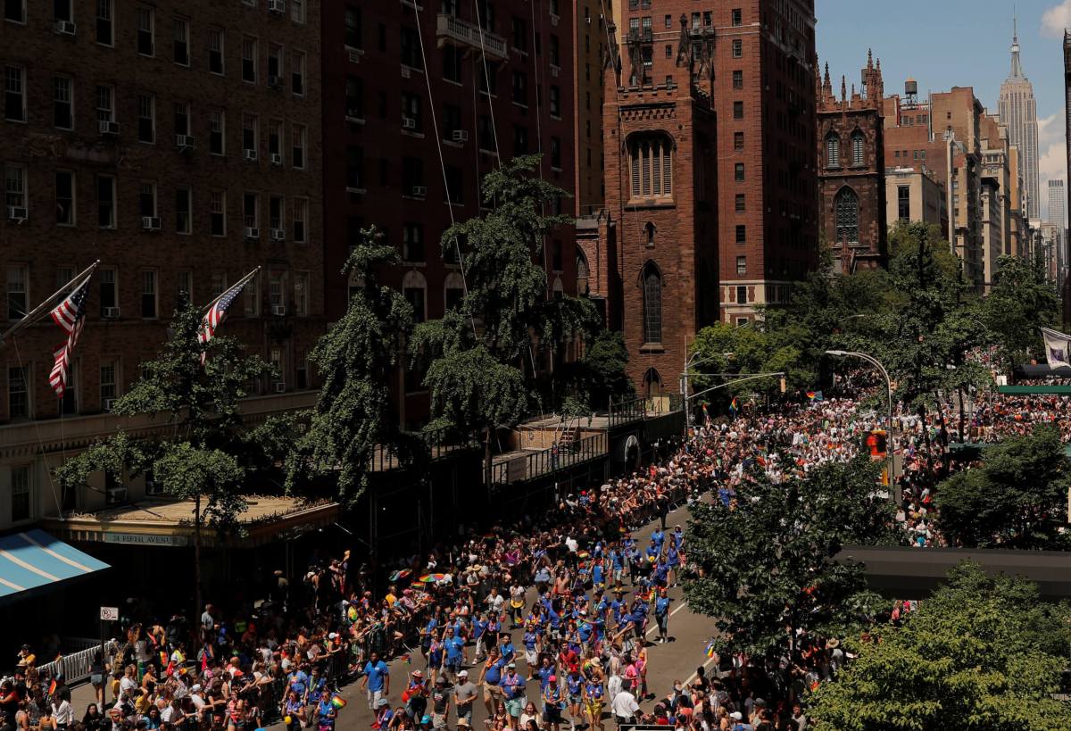 People march down 5th Avenue during the 2019 World Pride NYC and Stonewall 50th LGBTQ Pride Parade in New York