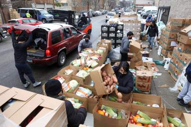 Food is distributed at the nonprofit New Life Centers’ food pantry in Chicago