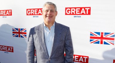 Mackintosh, producer of the film “Les Miserables”, which is a best picture Oscar nominee, arrives at the Great British Film Reception to honor the British Oscar nominees at the residence of the British Consul General in Los Angeles