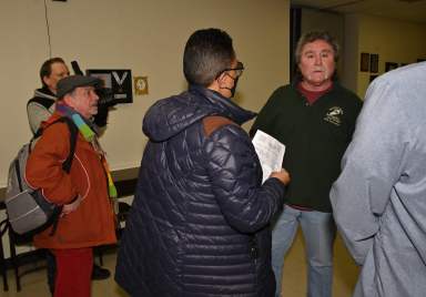 In this picture from last year, applicants plead with Larry Cummings as he rejects their bid to participate in the annual Staten Island St. Patrick's Day Parade.