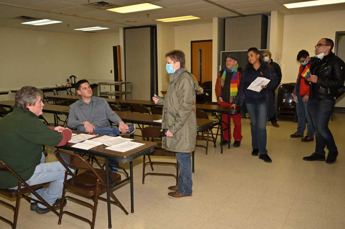 Staten Island Pride Center executive director Carol Bullock and Pride Center board member Alex Carr (second from left) engage with then-Staten Island St. Patrick's Day Parade organizer Larry Cummings in 2022.
