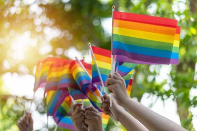 LGBT pride or LGBTQ+ gay pride with rainbow flag for lesbian, gay, bisexual, and transgender people human rights social equality movements in June month