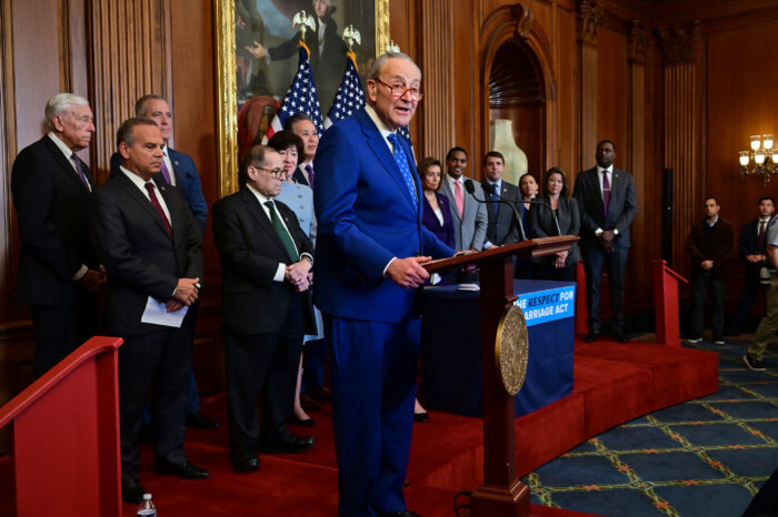 Chuck Schumer at the podium.