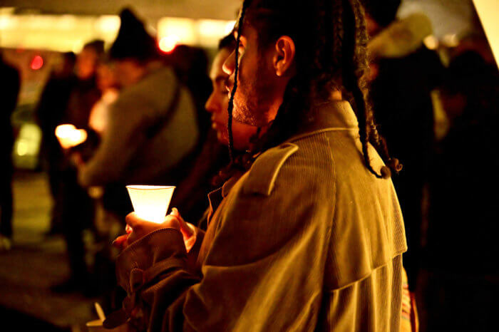 Looking on during the candlelight vigil.