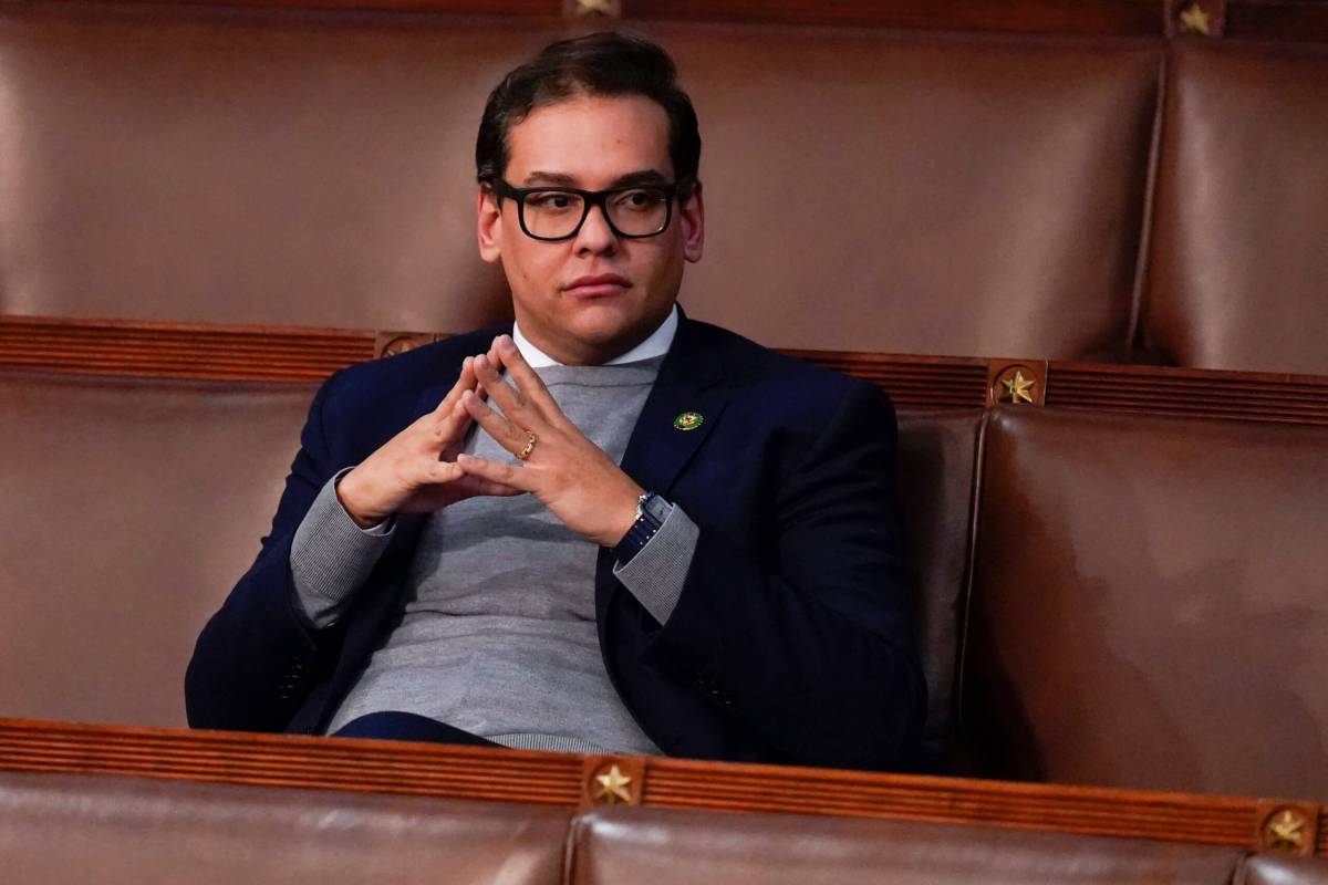 Representative George Santos waits for the start of a session in the House chamber in Washington on Friday, Jan. 6, 2023.