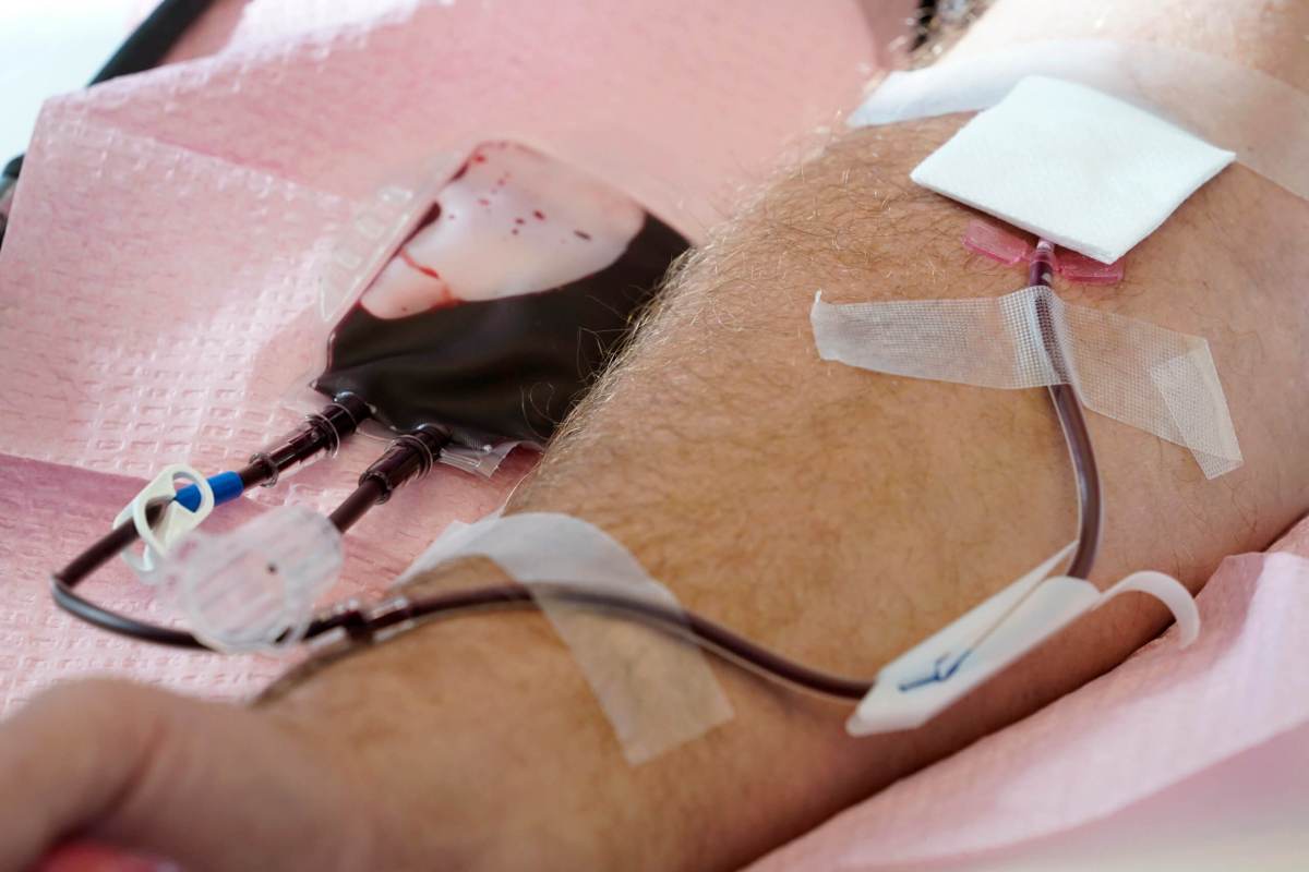 A person donates blood.