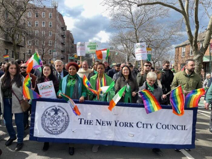 The City Council contingent, led by Speaker Adrienne Adams (center), marches along.