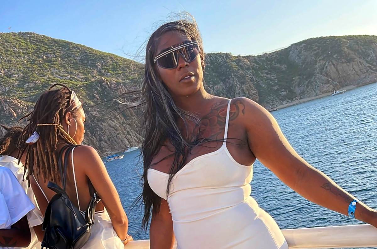 In this family photo provided by sister Kilya Williams, Koko Da Doll, a subject of the documentary "Kokomo City," about the lives of transgender Black women, poses for a picture on vacation near Cabo San Lucas, Mexico, on Sept. 24, 2022.