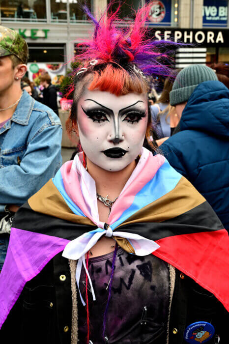 Standing up for trans youth while donning the Progress Pride Flag.