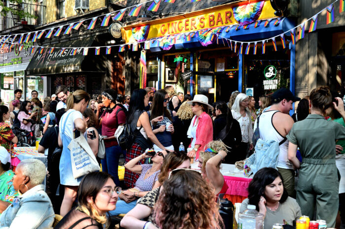 Crowds hover around Ginger's Bar during Brooklyn Pride.