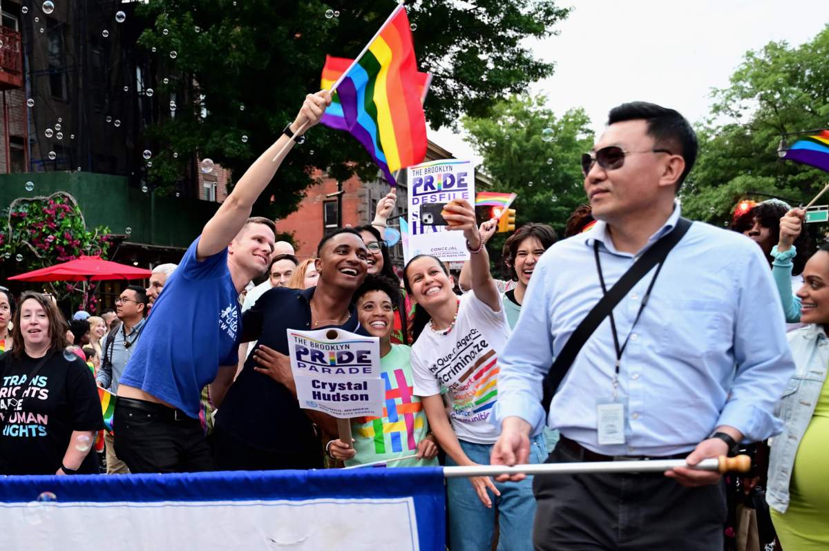 The City Council's LGBTQIA+ Caucus members Erik Bottcher, Chi Ossé, Crystal Hudson, and Tiffany Cabán pose for a picture at Brooklyn Pride.