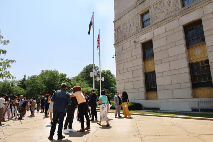 Gathering for the flag-raising ceremony.