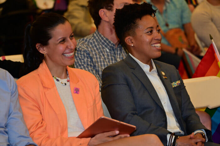 Cabán and Hudson react during the Council's Pride event.