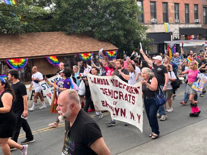 LGBTQ political clubs greet spectators during the Brooklyn Pride March.