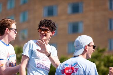 Joe Locke (center) with his "Heartstopper" co-star Kit Connor (left) at the Capital Pride Parade in Washington, DC.