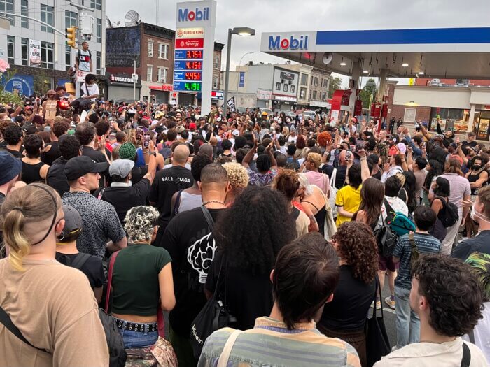 The audience continued to grow until it spread out onto the street.