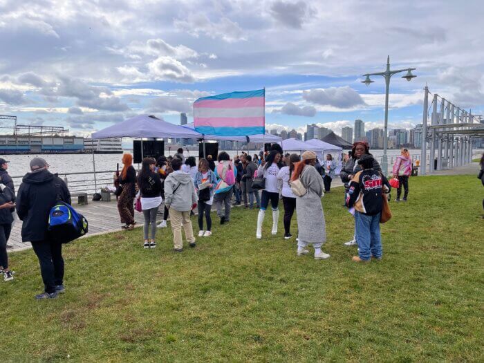 The crowd scatters out at the conclusion of the rally at the Christopher Street Pier.