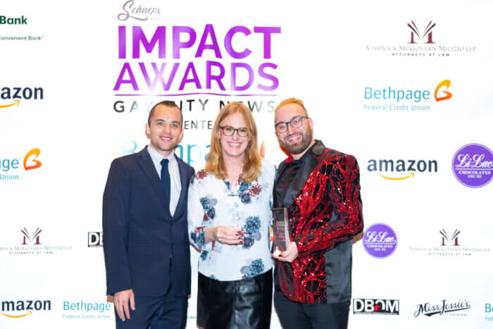 Matt Tracy, editor in chief of Gay City News (left), with honorees Jason Graubard and McKenzie Keating.