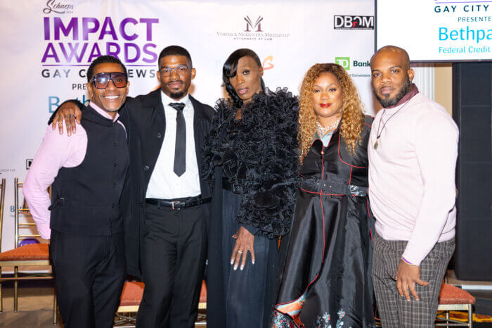 Honorees Nick Wiggins, Grace Detrevarah, and Cordelia Donovan with past honoree P.J. Ryan.