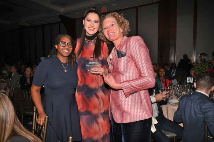 New York Liberty CEO Keia Clarke with center Stef Dolson and former WNBA player Sue Wicks.