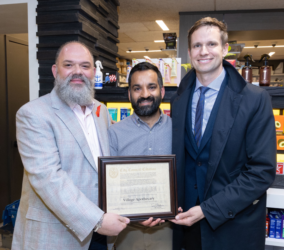 Village Apothecary receives a City Council citation from Councilmember Erik Bottcher of Manhattan.