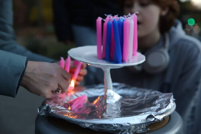 High school students prepare a memorial display in Washington Square Park on Nov. 20 for Transgender Day of Remembrance.