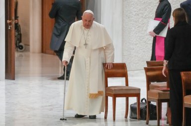 Pope Francis arrives in the Paul VI hall on the occasion of the weekly general audience at the Vatican, Wednesday, Dec. 13, 2023.