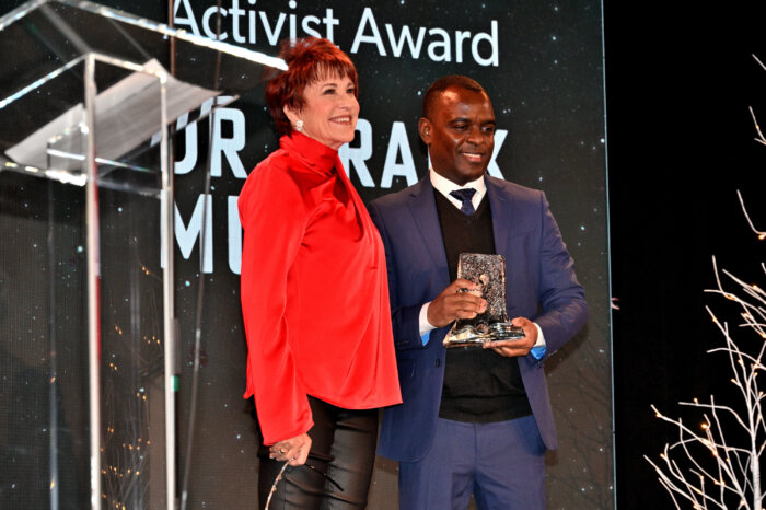 Presenter and board member Lorna Luft and awardee Dr. Frank Mugisha, who hails from Uganda.