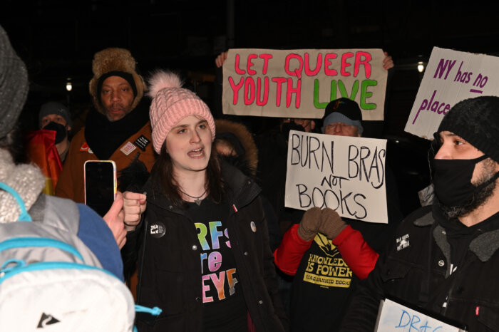 Out trans rabbi Abby Stein speaks out at the protest.