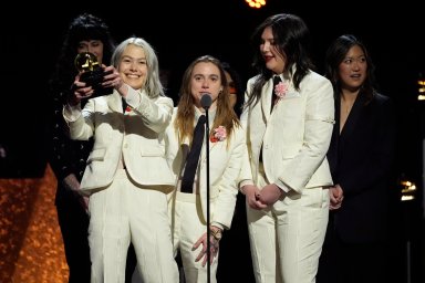 Phoebe Bridgers, from left, Julien Baker, and Lucy Dacus, of boygenius, accept the award for best alternative music album for "The Record" during the 66th annual Grammy Awards on Sunday, Feb. 4, 2024, in Los Angeles.