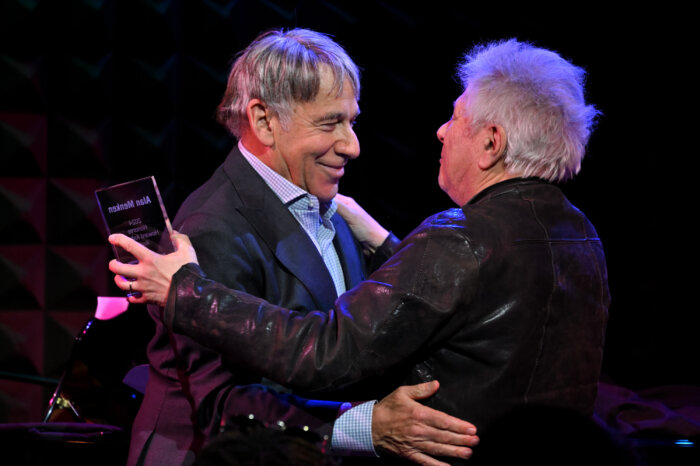 Stephen Schwartz presents Alan Menken with the Howard Ashman Award.