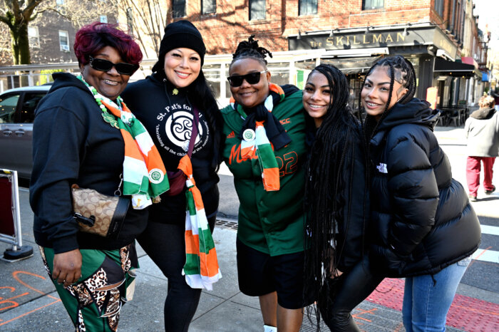 St. Pat's for All volunteers decked out in orange and green.