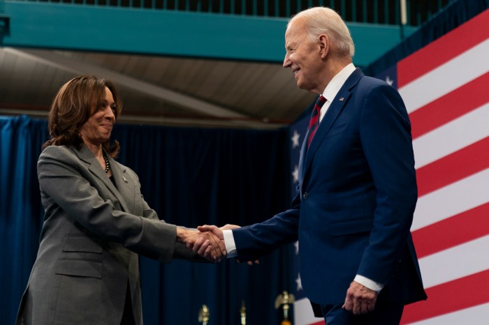 Vice President Kamala Harris, left, shakes hands with President Joe Biden, right, after introducing him at a campaign event in Raleigh, N.C., Tuesday, March 26, 2024.