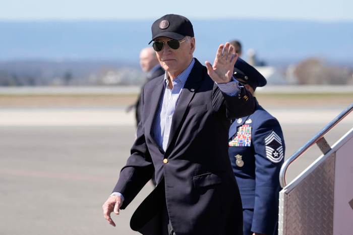 President Joe Biden waves as he arrives Air Force One, Tuesday, March 29, 2024, in Hagerstown, Md.